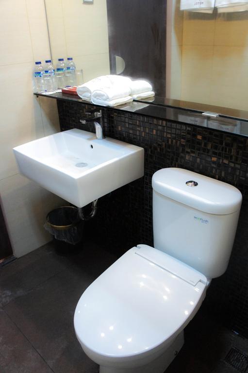 Favor Hotel Makassar City Center By Life Стая снимка
